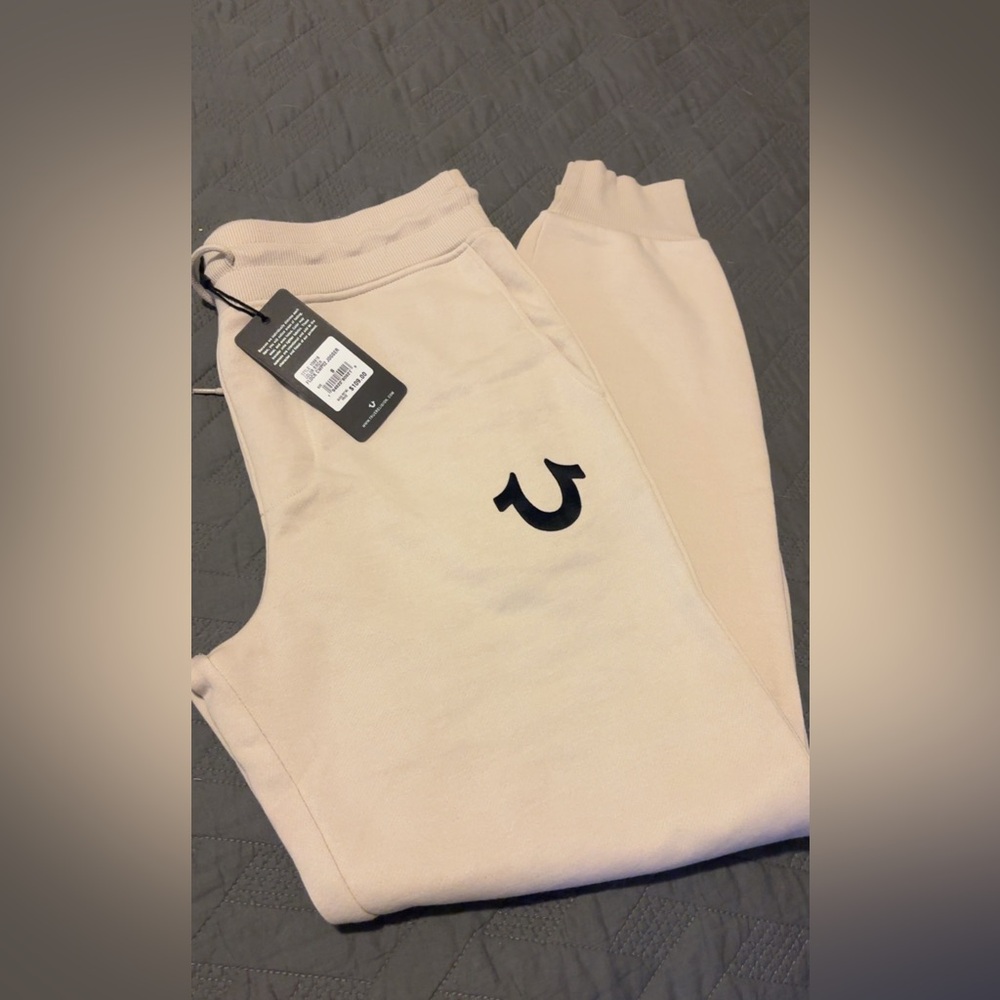True Religion Cream Joggers with Black Emblem